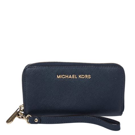 michael kors navy blue wristlet|Michael Kors oversized wallet.